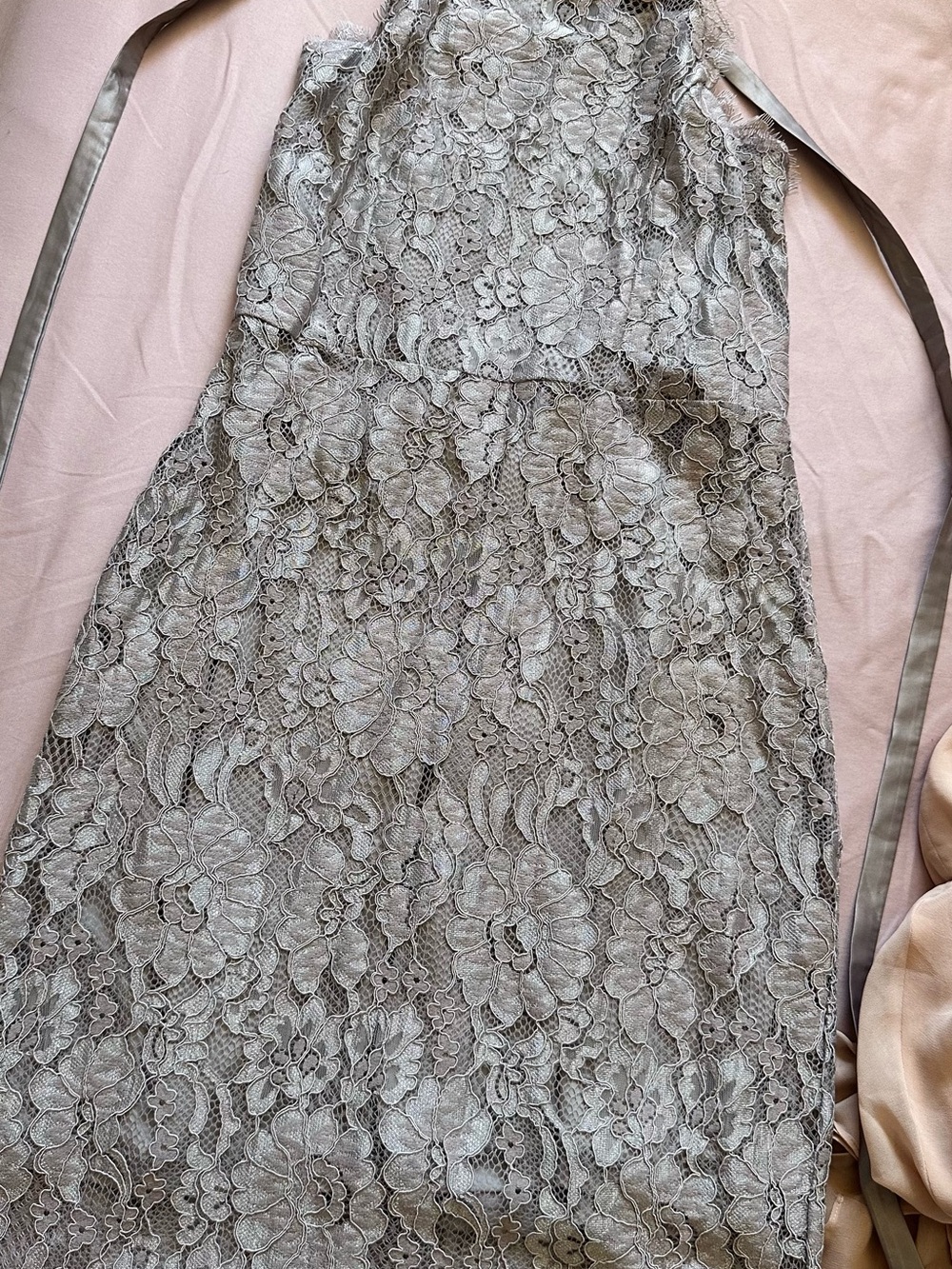 Gray formal dress, backless and laces up. Never worn.